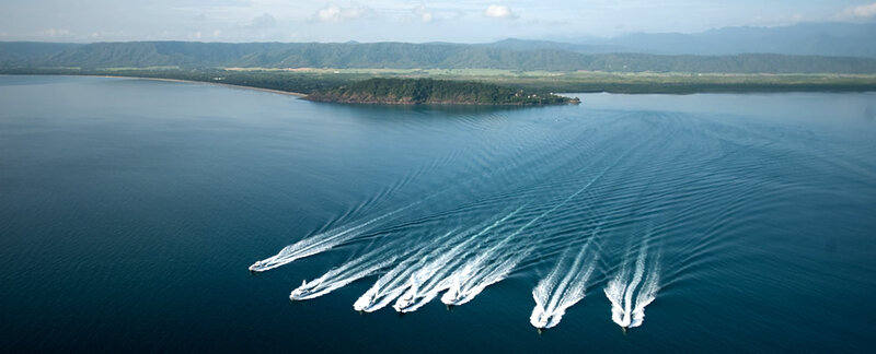 Bird view of Port Douglas with game fishing boats leaving marina